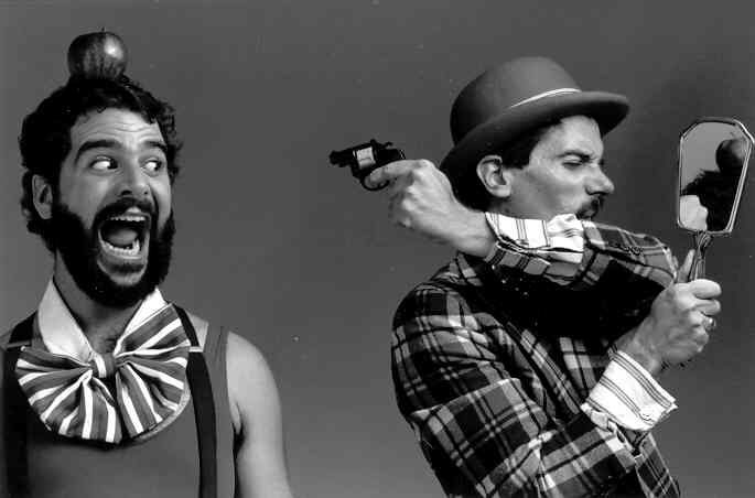 Robert (apple) and Angus (gun).  Photo by Paul Schraub